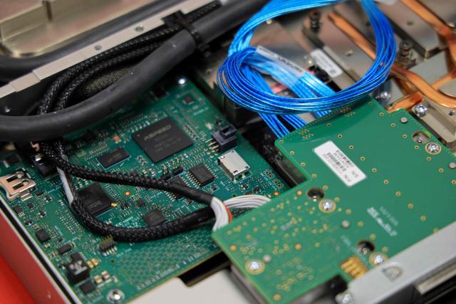 Thie general view shows circuit board details during a visit by France's President to the European Forum on Computing Power, Quantum Sciences and Technologies, and Semiconductors at the Very Large Computing Centre of the French Alternative Energies and Atomic Energy Commission (CEA) in Bruyeres-le-Châtel, south of Paris on May 22, 2026. (Photo by Ludovic MARIN / POOL / AFP)