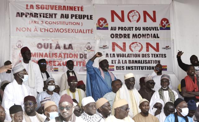(FILES) Protesters take part on February 20, 2022, in a demonstration calling for strictier repressive measures against homosexuality at the Obelisk Square in Dakar. Senegalese Prime Minister Ousmane Sonko on May 22, 2026 condemned Western "tyranny" in wanting to "impose" homosexuality and rejected any attempt to stop the application of a new law toughing sentences for same-sex relations. (Photo by SEYLLOU / AFP)