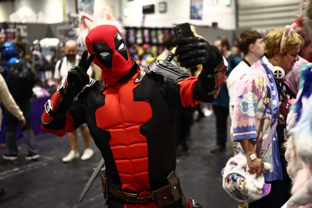 A cosplayer poses for a photo during the MCM Comic Con at ExCeL exhibition centre in London on May 22, 2026. (Photo by Henry NICHOLLS / AFP)