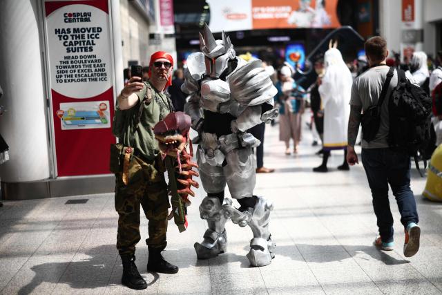A cosplayer poses for a photo during the MCM Comic Con at ExCeL exhibition centre in London on May 22, 2026. (Photo by Henry Nicholls / AFP)