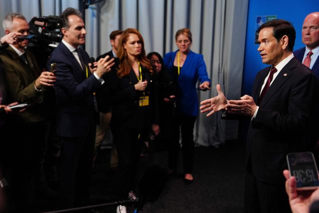 United States Secretary of State Marco Rubio (R) speaks with journalists during a meeting of NATO foreign ministers in Helsingborg, Sweden, on May 22, 2026. Foreign ministers of the 32 NATO member states gathered in the Swedish city to finalise preparations for the upcoming Ankara Summit. (Photo by Julia Demaree Nikhinson / POOL / AFP)