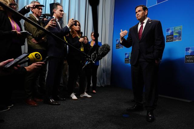 United States Secretary of State Marco Rubio (R) speaks with journalists during a meeting of NATO foreign ministers in Helsingborg, Sweden, on May 22, 2026. Foreign ministers of the 32 NATO member states gathered in the Swedish city to finalise preparations for the upcoming Ankara Summit. (Photo by Julia Demaree Nikhinson / POOL / AFP)