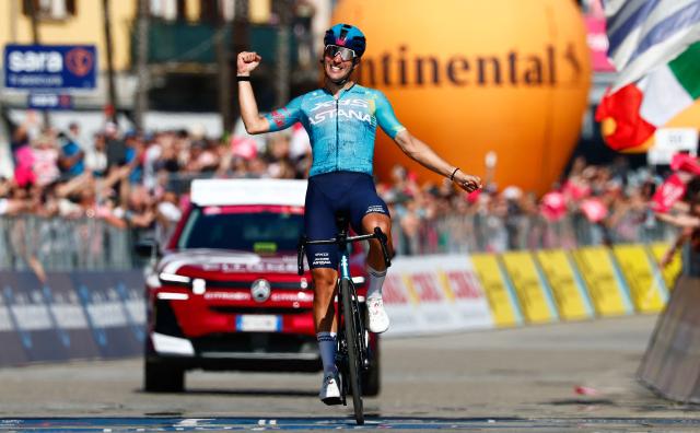 XDS Astana Team Italian rider Alberto Bettiol celebrates as he crosses the finish line to win the 13th stage of the Giro d'Italia 2026 - Tour of Italy cycling race between Alessandria and Verbania, Italy, on May 22, 2026. (Photo by Luca Bettini / AFP)