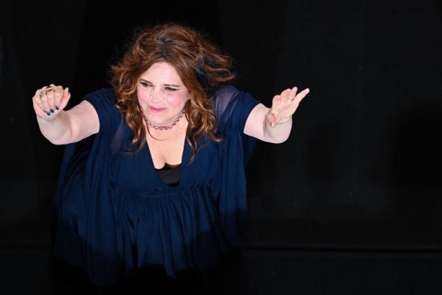 French director, actress and screenwriter Agnes Jaoui acknowledges the audience as she arrives for the screening of the film "L'Objet du delit" (Crescendo) at the 79th edition of the Cannes Film Festival in Cannes, southern France on May 22, 2026. (Photo by Antonin THUILLIER / AFP)