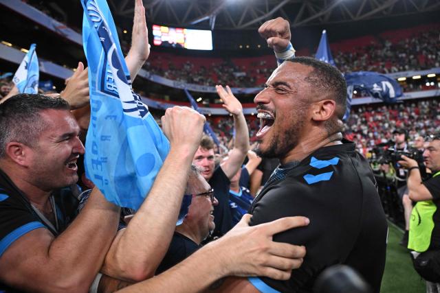 Montpellier's French prop Wilfrid Hounkpatin celebrates with supporters after winning the EPCR Challenge Cup rugby union final match between Montpellier Herault Rugby and Ulster Rugby at San Mames Stadium in Bilbao on May 22, 2026. (Photo by Javier SORIANO / AFP)