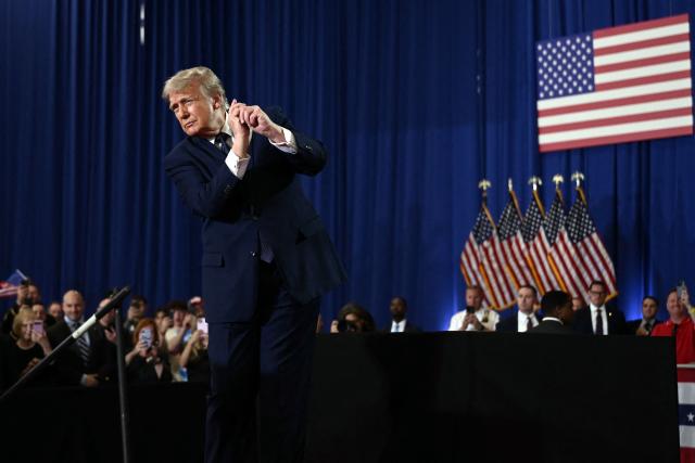 US President Donald Trump reacts after speaking about the economy during an event at Rockland Community College Fieldhouse in Suffern, New York, on May 22, 2026. Trump is the first sitting president to visit the northern New York City suburbs since Gerald Ford in 1976. (Photo by Brendan SMIALOWSKI / AFP)