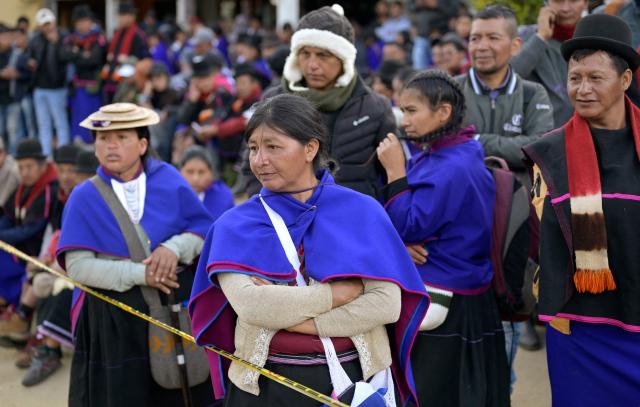 Misak indigenous people gather at the Guambia reserve near Silvia, Cauca department, Colombia on May 22, 2026. A land dispute between two indigenous groups left six people dead and 65 injured in a troubled region of Colombia on May 22, 2026, according to local authorities. (Photo by Joaquin SARMIENTO / AFP)