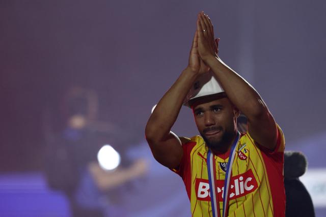 Lens' French defender #14 Matthieu Udol celebrates after winning the French Cup final football match between RC Lens and OGC Nice at the Stade de France stadium, in Saint-Denis, on the outskirts of Paris, on May 22, 2026. (Photo by FRANCK FIFE / AFP)