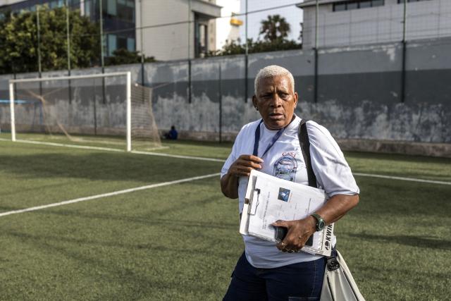 Silveria Nedio “Nita”, historic manager of the Cape Verde women's national football team and director of the Bola Pra Frente football academy looks on during practice in Praia, on May 22, 2026. Bola Pra Frente is considered one of the most renowned football academies in Cape Verde, with former students Joao Paulo Fernandes and Kevin Pina being part of the national team set to compete at the World Cup 2026. (Photo by PATRICK MEINHARDT / AFP)