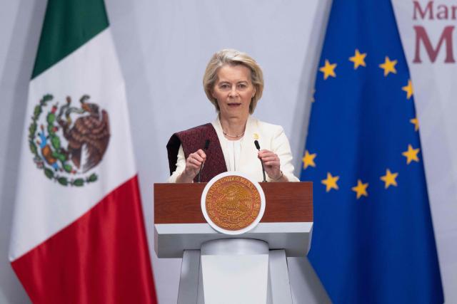 European Commission President Ursula von der Leyen gestures during a press conference with Mexico's President Claudia Sheinbaum (out of frame) at the National Palace in Mexico City on May 22, 2026. The European Union and Mexico will sign a deal on May 22 to reduce tariffs on each other's goods, as both seek to lessen their dependence on trade with the United States. (Photo by Gerardo Luna / AFP)