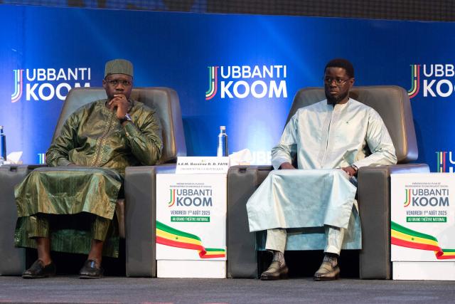 (FILES) Senegalese Prime Minister Ousmane Sonko (L) and Senegalese President Bassirou Diomaye Faye (R) attend the opening of the official ceremony of the presentation of the economic and social recovery plan by the head of government at the Grand Theatre in Dakar on August 1, 2025. Senegal President Bassirou Diomaye Faye on Friday sacked Prime Minister Ousmane Sonko and dissolved the government after months of tensions, deepening a crisis in the debt-laden west African nation.
The shock announcement was made on state television in a decree read out by presidential aide Oumar Samba Ba, who said Faye "has ended the duties of Ousmane Sonko...  and consequently those of the ministers and secretaries of state who are members of the government". (Photo by SEYLLOU / AFP)