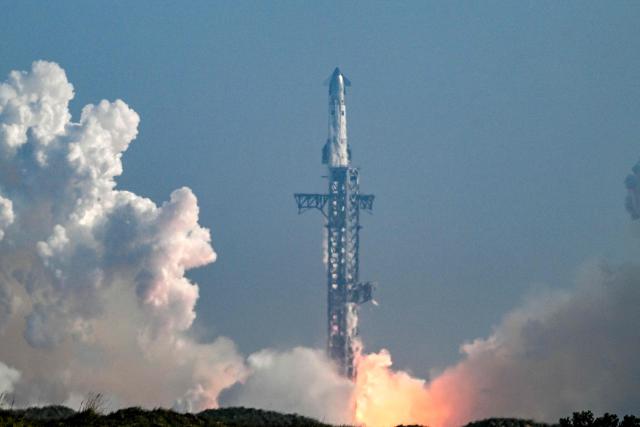 SpaceX's Starship 39 rocket launches from Starbase during the 12th test flight as seen from South Padre Island, Texas, on May 22, 2026. Elon Musk's SpaceX on May 22 launched its latest Starship, sending the mammoth rocket soaring into the Texas skies after its initial attempt was scrubbed due to technical issues. The Starship spacecraft and Super Heavy rocket booster appeared to separate as expected, but the company's spokesperson Dan Huot said on the livestream that the booster did not complete a burn necessary to steer itself to a controlled landing, meaning it likely can't make a precision touchdown as hoped. (Photo by RONALDO SCHEMIDT / AFP)
