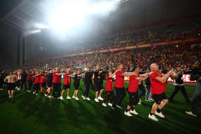 Members of Lens RC celebrate after Lens RC won the French Cup final football match against Nice OGC in Lens, northern France, on May 22, 2026. (Photo by FRANCK FIFE / AFP)