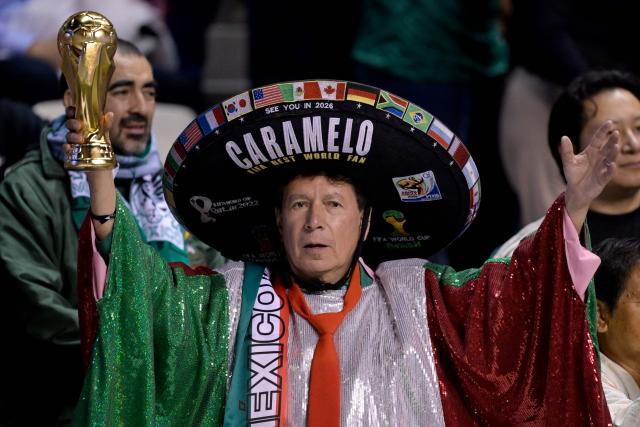Hector Chavez "Caramelo," known as "the number one fan" of the Mexican national football team gestures during a friendly football match between Mexico and Ghana at the Cuauhtemoc Stadium in Puebla, Mexico, on May 22, 2026. (Photo by Alfredo ESTRELLA / AFP)