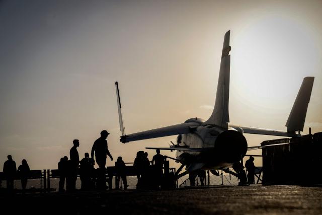 Fans experience the USS Midway Museum during the Top Gun 40th Anniversary celebration in San Diego, on May 22, 2026. (Photo by SANDY HUFFAKER / AFP)