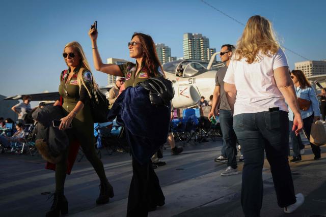 Fans experience the USS Midway Museum during the Top Gun 40th Anniversary celebration in San Diego, on May 22, 2026. (Photo by SANDY HUFFAKER / AFP)