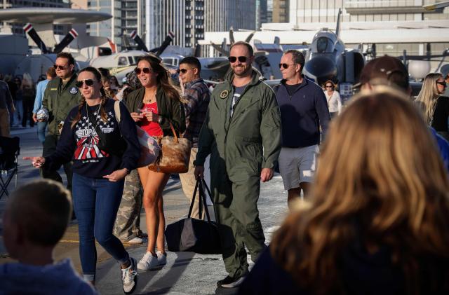 Fans experience the USS Midway Museum during the Top Gun 40th Anniversary celebration in San Diego, on May 22, 2026. (Photo by SANDY HUFFAKER / AFP)