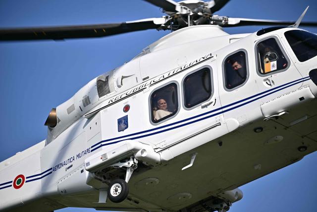 Pope Leo XIV arrives by helicopter in Acerra for a pastoral visit to the community of the 'Land of Fires' on May 23, 2026. The Land of Fires (terra dei fuochi) is an area in the Southern Italian region of Campania were, systematically, since the end of the 80s, toxic wastes have been dumped by organized crime (Camorra) causing waste-related environmental crimes. Acerra and the surrounding territory has higher-than-average cancer rates, linked to the dumping, burning, and burying of toxic waste. (Photo by Filippo MONTEFORTE / AFP)