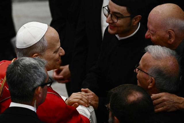 Pope Leo XIV arrives at the cathedral of Acerra for a pastoral visit to the community of the 'Land of Fires' on May 23, 2026. The Land of Fires (terra dei fuochi) is an area in the Southern Italian region of Campania were, systematically, since the end of the 80s, toxic wastes have been dumped by organized crime (Camorra) causing waste-related environmental crimes. Acerra and the surrounding territory has higher-than-average cancer rates, linked to the dumping, burning, and burying of toxic waste. (Photo by Filippo MONTEFORTE / AFP)