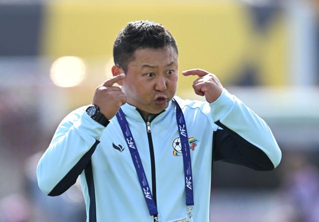 Naegohyang Women's FC head coach Ri Yu Il reacts during the AFC Women's Champions League final football match between North Korea's Naegohyang Women's FC and Japan's Tokyo Verdy Beleza in Suwon on May 23, 2026. (Photo by Jung Yeon-je / AFP)