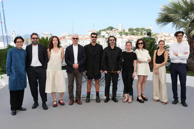 (From L) Vietnamese director Thien An Nguyen, Portuguese director Daniel Soaers, Serbian director Tamara Todorovic, Polish director Michal Toczek, Colombian director Theo Montoya, Argentine director Federico Luis, French director Lola Degove, Swedish director Niki Lindroth von Bahr, French director Mathilde Bedouet and French director Hadrien Bels pose during a photocall of the directors of the short films in competition at the 79th edition of the Cannes Film Festival in Cannes, southern France on May 23, 2026. (Photo by Thibaud MORITZ / AFP)