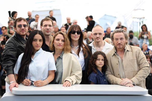 (From L) French actor Bastien Bouillon, French actress Hafsia Herzi, French actor Paul Hamy, French screenwriter Lea Mysius, Italian actress Monica Bellucci, French actor Alane Delhaye, French actress Tawba El Gharchi and French actor Benoit Magimel pose during a photocall of the film "Histoires de la nuit" (The Birthday Party) at the 79th edition of the Cannes Film Festival in Cannes, southern France on May 23, 2026. (Photo by Sameer AL-DOUMY / AFP)