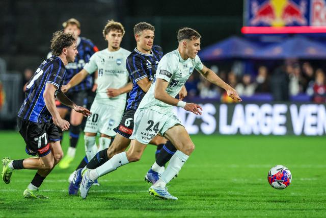 Sydney FC's Paul Okon-Engstler (R) is challenged during the A League Grand final football match between Auckland FC and Sydney FC at Go Media Stadium in Auckland on May 23, 2026. (Photo by DJ MILLS / AFP)