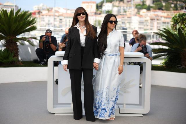 Italian actress Monica Bellucci and French actress Hafsia Herzi pose during a photocall of the film "Histoires de la nuit" (The Birthday Party) at the 79th edition of the Cannes Film Festival in Cannes, southern France on May 23, 2026. (Photo by Valery HACHE / AFP)