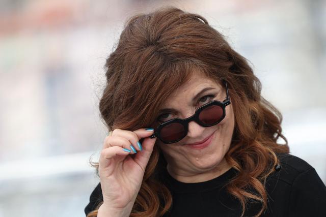 French director Agnes Jaoui poses during a photocall of the film "L'Objet du delit" (Crescendo) at the 79th edition of the Cannes Film Festival in Cannes, southern France on May 23, 2026. (Photo by Valery HACHE / AFP)