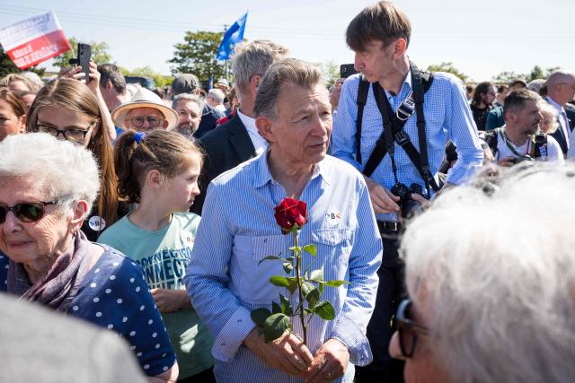 People attend an event organised by the "Union of Expellees within the Christian Social Union party" (UdVA, Union der Vertriebenen, Aussiedler und Deutschen Minderheiten der CSU) to commemorate the flight and expulsion of Sudeten Germans during and after World War II, on May 23, 2026 in Pohorelice, South Moravia, Czech Republic. (Photo by Radek MICA / AFP)