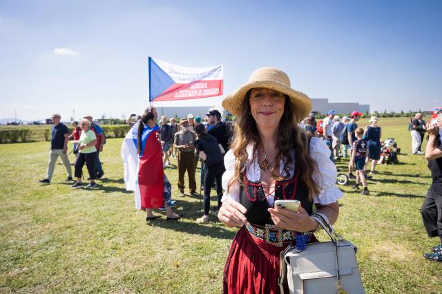People attend an event organised by the "Union of Expellees within the Christian Social Union party" (UdVA, Union der Vertriebenen, Aussiedler und Deutschen Minderheiten der CSU) to commemorate the flight and expulsion of Sudeten Germans during and after World War II, on May 23, 2026 in Pohorelice, South Moravia, Czech Republic. (Photo by Radek MICA / AFP)