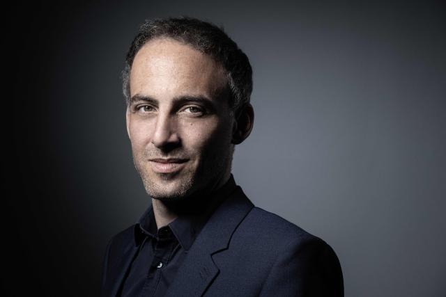 (FILES) Front runner candidate for the upcoming European election for the French political parties "Place Publique" and Socialist Party (PS) Raphael Glucksmann poses during a photo session in Paris, on April 23, 2019. With the publication of a book "Nous avons encore envie" on May 28, 2026, and along with a rally, European Member of Parliament Raphael Glucksmann hopes to build momentum before the summer ahead of a possible declaration of candidacy for France's 2027 presidential election. (Photo by JOEL SAGET / AFP)