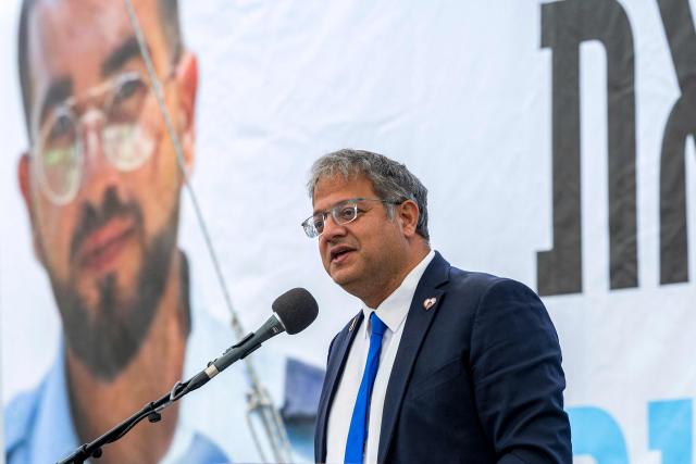 (FILES) Israel's far-right National Security Minister Itamar Ben Gvir speaks during the funeral of Israeli hostage Ran Gvili, whose remains were finally brought back to Israel on January 26, in the southern town of Meitar on January 28, 2026. France has banned Israeli National Security Minister Itamar Ben-Gvir from entering the country after he posted a video showing activists from the “Gaza flotilla” kneeling with their hands tied, sparking an international outcry, France's Foreign Affairs Minister Jean-Noel Barrot announced on May 23, 2026 on his X account, condemning "unspeakable acts against French and European citizens travelling on the Global Sumud flotilla". (Photo by Chaim Goldberg / POOL / AFP)