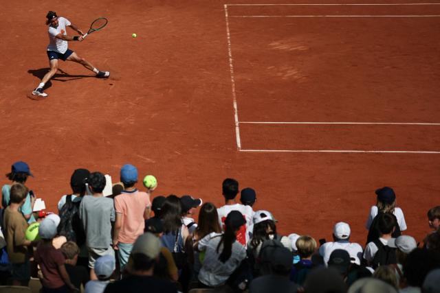 Greece's Stefanos Tsitsipas plays a forehand return to Argentine's Sebastien Baez during their men's singles match of the French Open tennis tournament on Court Simonne-Mathieu at the Roland-Garros Complex in Paris on May 23, 2026. (Photo by Anne-Christine POUJOULAT / AFP)
