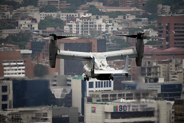 A US Marines MV-22B Osprey aircraft lands at the US Embassy, in Caracas, on May 23, 2026, during an air evacuation drill. (Photo by Federico PARRA / AFP)