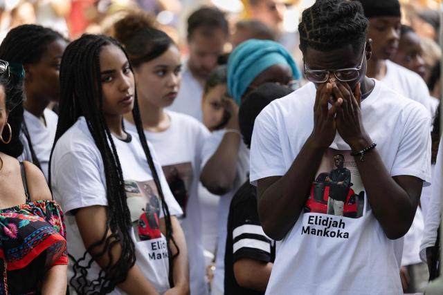 Relatives take part in a silent march in tribute to Elidjah Mankoka in Nantes, western France on May 23, 2026, after his death by shooting on May 14. The death of fifteen year-old Elidjah along with the wounding of two other minors on the same day, took place in the Port-Boyer neighbourhood on the western French city, which had already been hit by deadly shootings linked to drug trafficking earlier in the year. (Photo by Fred TANNEAU / AFP)