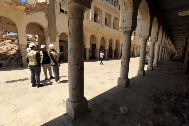 Engineers access the reconstruction of the historical centre, partially destroyed during the country's civil war (2014-2017), in the Old City of Benghazi, situated in eastern Libya along the Mediterranean coast, on May 23, 2026. Libya remains plagued by division and instability after years of unrest following the NATO-backed uprising that toppled longtime leader Muammar Gaddafi in 2011. Libya is still divided between the UN-recognised government in the west and its eastern rival in the east, backed by military commander Khalifa Haftar. (Photo by Abdullah DOMA / AFP)