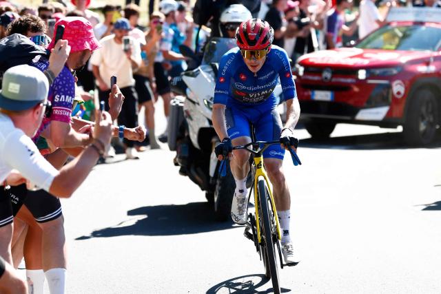 Team Visma Lease a Bike Danish rider Jonas Vingegaard climbs to win the 14th stage of the Giro d'Italia 2026 - Tour of Italy cycling race between Aosta and Pila (Gressan), Italy, on May 23, 2026. (Photo by Luca Bettini / AFP)