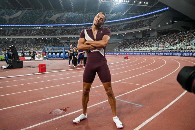 US's Jamal Britt celebrates after winning the men's 110m hurdles final event during the Xiamen Diamond League athletics meeting at Egret Stadium in Xiamen, in China’s eastern Fujian province on May 23, 2026. (Photo by Hector RETAMAL / AFP)