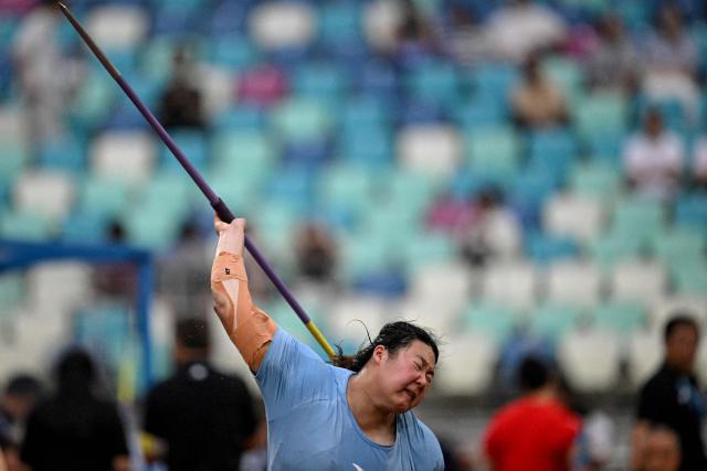 China’s Yan Ziyi competes in the women’s javelin throw final event during the Xiamen Diamond League athletics meeting at Egret Stadium in Xiamen, in China’s eastern Fujian province on May 23, 2026. (Photo by Jade GAO / AFP)