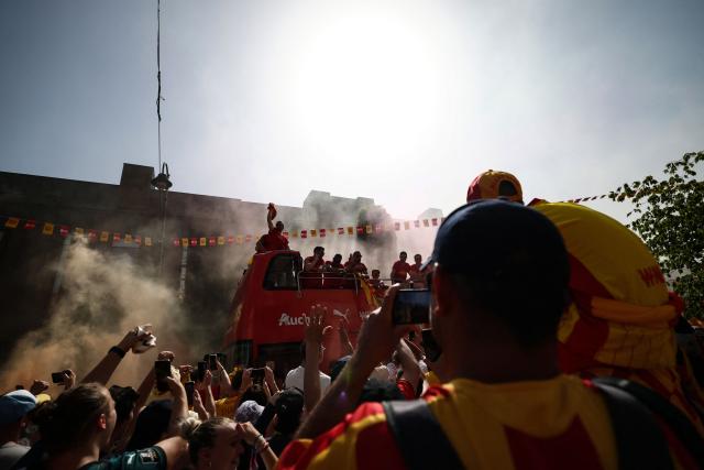 RC Lens' players parade for supporters atop a double-decker bus during celebrations following their victory in the French Cup final football match against OGC Nice, in Lens, northern France on May 23, 2026. (Photo by FRANCK FIFE / AFP)