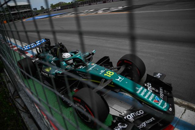 Aston Martin's Canadian driver Lance Stroll races during the Sprint race ahead of the 2026 Formula 1 Grand Prix du Canada at Circuit Gilles-Villeneuve in Montreal, Canada, on May 23, 2026. (Photo by Andrej Ivanov / AFP)