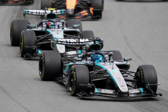 Mercedes' British driver George Russell (R) and Mercedes' Italian driver Kimi Antonelli race during the Sprint race ahead of the 2026 Formula 1 Grand Prix du Canada at Circuit Gilles-Villeneuve in Montreal, Canada, on May 23, 2026. (Photo by Geoff Robins / AFP)