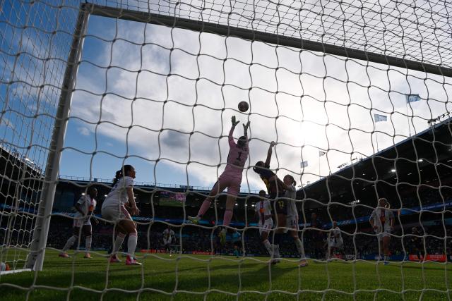 Lyon's Chilean goalkeeper #01 Christiane Endler makes a save during the UEFA Women's Champions League final football match between FC Barcelona and Olympique Lyonnais (OL) at the Ullevaal Stadium in Oslo, Norway on May 23, 2026. (Photo by Jonathan NACKSTRAND / AFP)