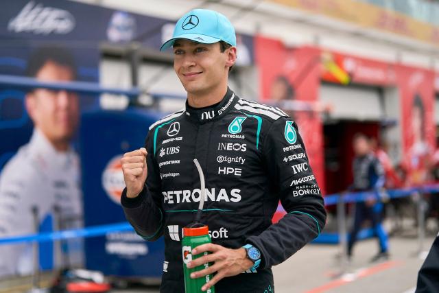 Mercedes' British driver George Russell celebrates after winning the Sprint race ahead of the 2026 Formula 1 Grand Prix du Canada at Circuit Gilles-Villeneuve in Montreal, Canada, on May 23, 2026. (Photo by Geoff Robins / AFP)