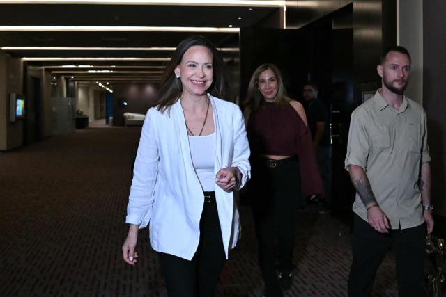 Venezuelan opposition leader Maria Corina Machado arrives for a press conference in Panama City on May 23, 2026. Machado is visiting Panama as part of a regional tour, during which she is set to meet with members of the Venezuelan diaspora and Panamanian President Jose Raul Mulino. (Photo by MARTIN BERNETTI / AFP)