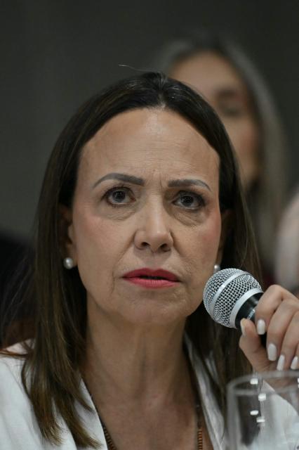 Venezuelan opposition leader Maria Corina Machado speaks during a press conference in Panama City on May 23, 2026. Machado is visiting Panama as part of a regional tour, during which she is set to meet with members of the Venezuelan diaspora and Panamanian President Jose Raul Mulino. (Photo by MARTIN BERNETTI / AFP)