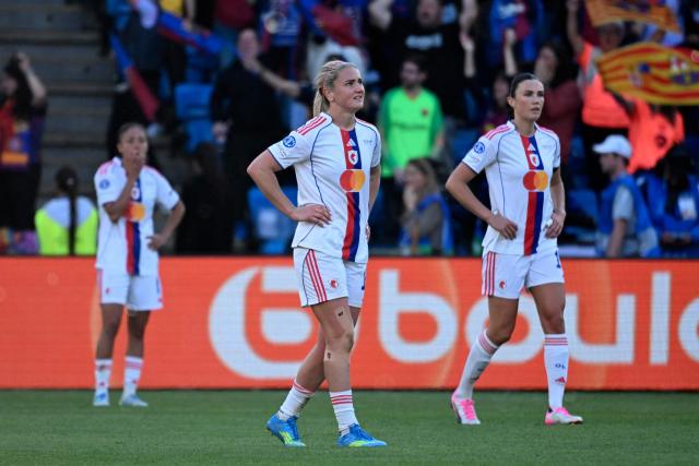 Olympique Lyonnais players react after FC Barcelona won the UEFA Women's Champions League final football match between FC Barcelona and Olympique Lyonnais (OL) at the Ullevaal Stadium in Oslo, Norway on May 23, 2026. (Photo by Jonathan Nackstrand / AFP)