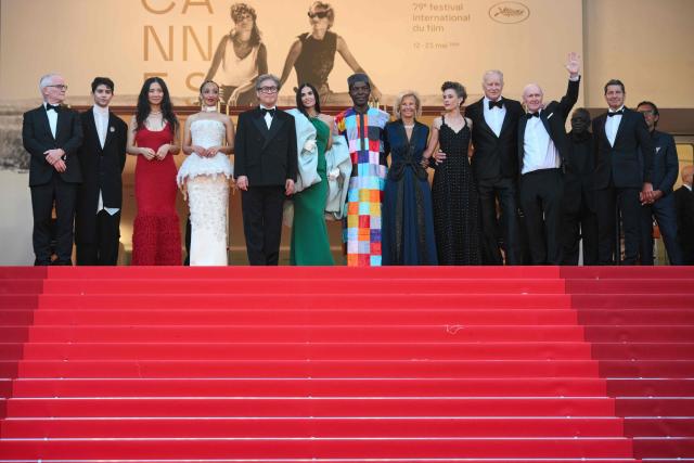 (From L) Cannes film festival director Thierry Fremaux, Member of the jury Chilean director and screenwriter Diego Cespedes, Member of the jury Chinese director and screenwriter Chloe Zhao, Member of the jury Irish-Ethiopian actress Ruth Negga, President of the jury South Korean director, screenwriter and producer Park Chan-wook, Member of the jury US actress and producer Demi Moore, Member of the jury Ivorian actor Isaach De Bankole, German media executive and President of the Cannes Film Festival Iris Knobloch, Member of the jury Belgian director and screenwriter Laura Wandel, Member of the jury Swedish actor Stellan Skarsgard and Member of the jury Scottish screenwriter Paul Laverty  pose on the red carpet ahead of the closing ceremony of the 79th edition of the Cannes Film Festival in Cannes, southern France, on May 23, 2026. (Photo by Olivier CHASSIGNOLE / AFP)