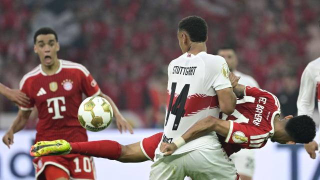 Bayern Munich's Colombian forward #14 Luis Diaz and Stuttgart's Swiss defender #14 Luca Jaquez vie for the ball during the German Cup (DFB Pokal) final football match FC Bayern Munich v VfB Stuttgart at the Olympic Stadium in Berlin, on May 23, 2026. (Photo by John MACDOUGALL / AFP) / DFB REGULATIONS PROHIBIT ANY USE OF PHOTOGRAPHS AS IMAGE SEQUENCES AND QUASI-VIDEO.